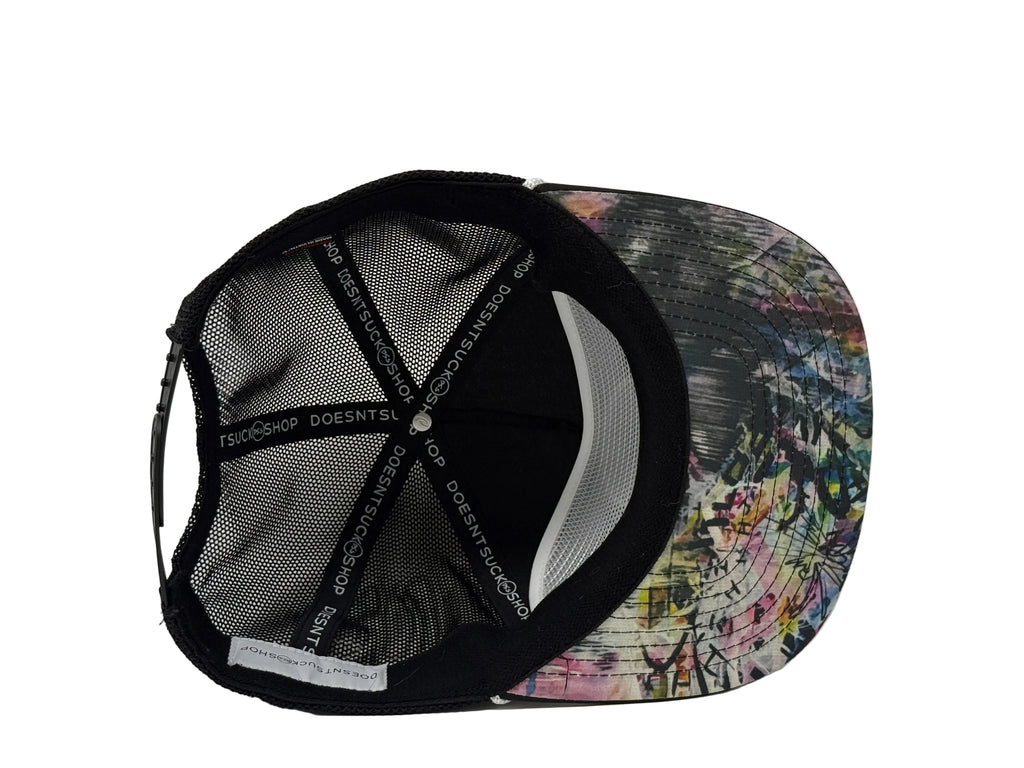 Black cap with floral pattern on a white background