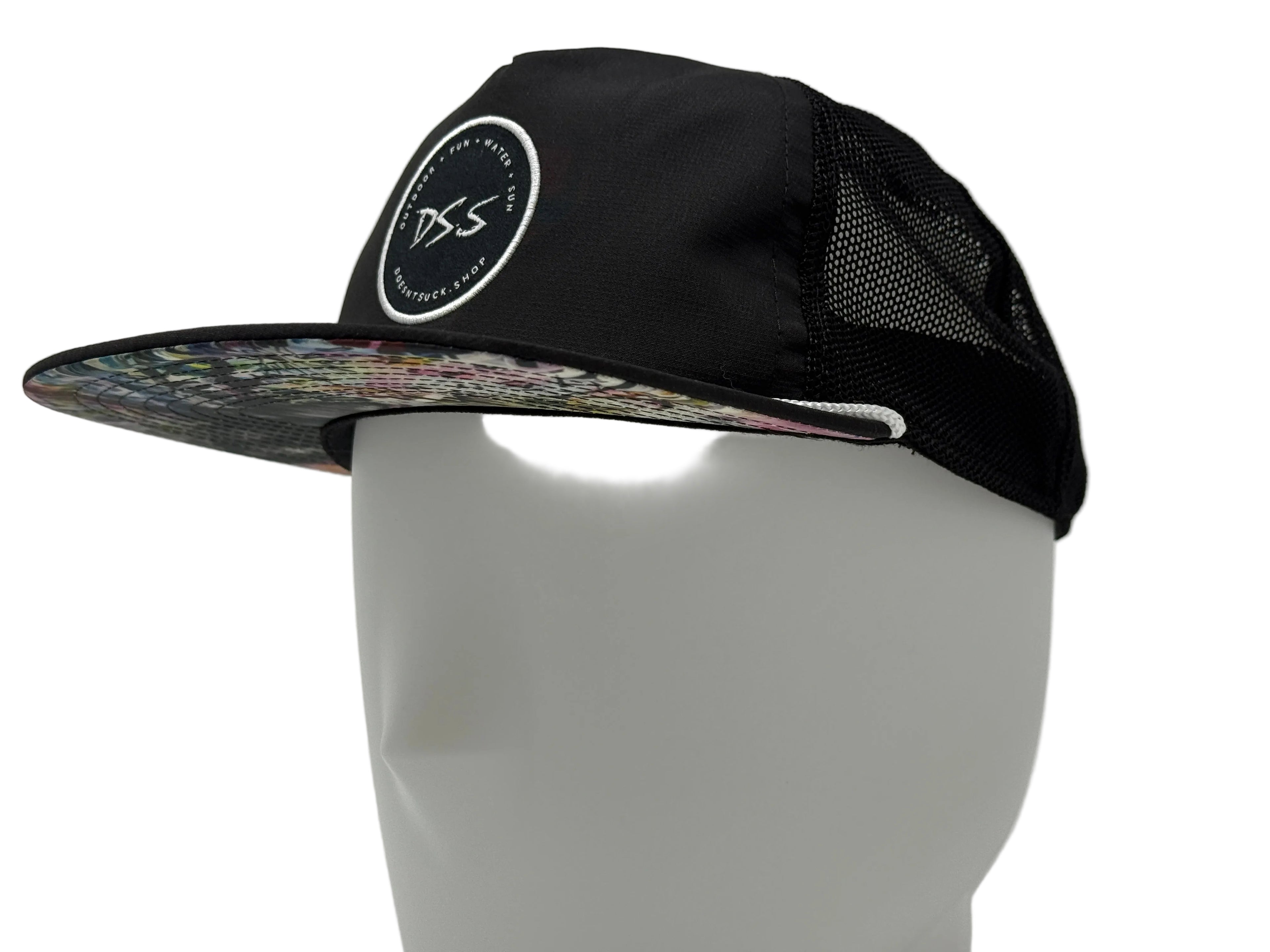 Black cap with a logo on a gray background