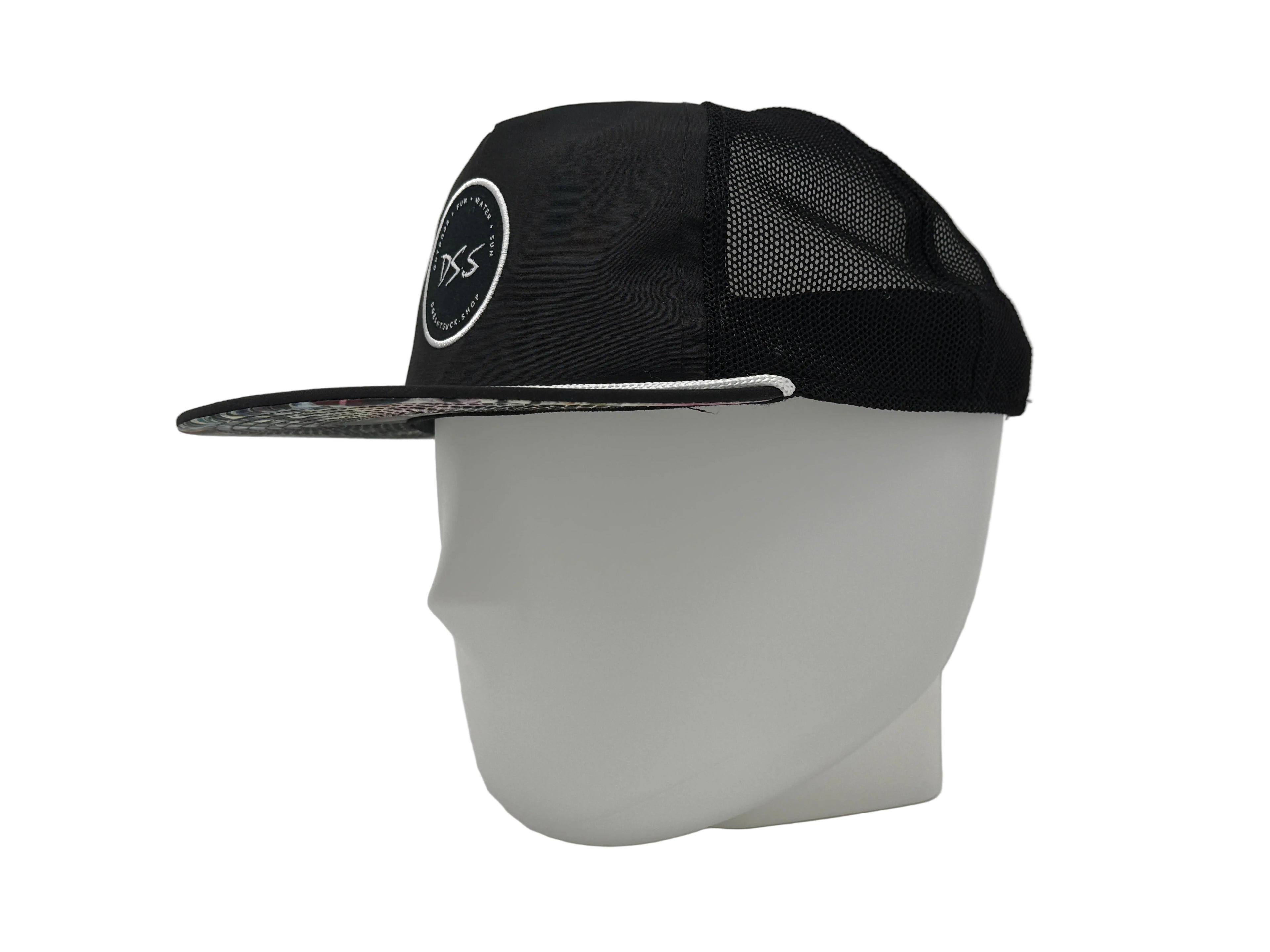 Black cap with a logo on a white mannequin head against a white background