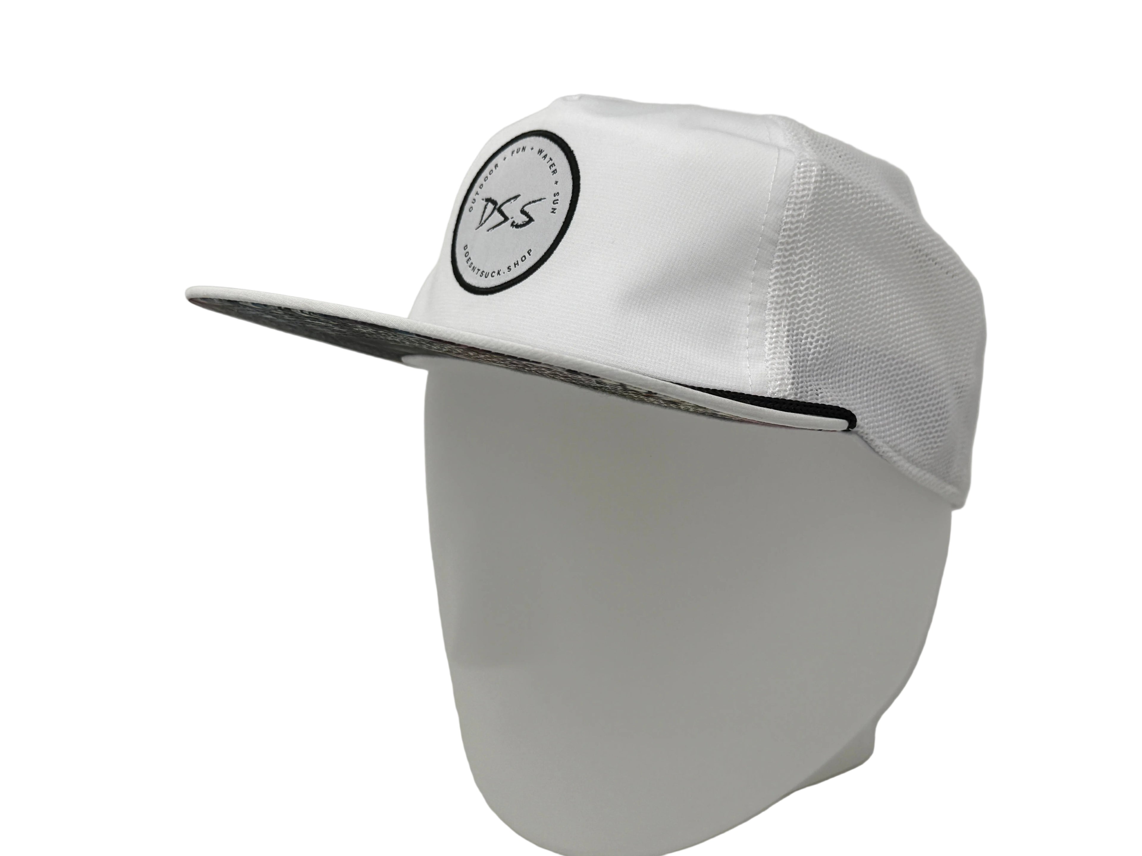 White cap with a black logo on a gray background