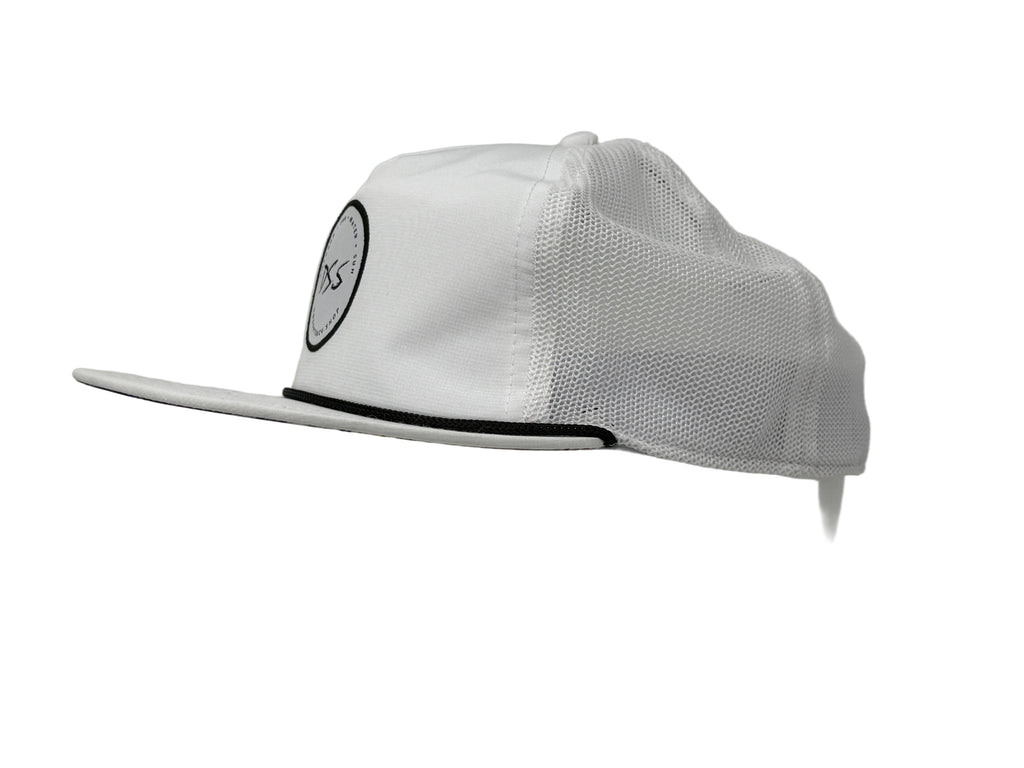 White cap with mesh back on a mannequin head against a gray background