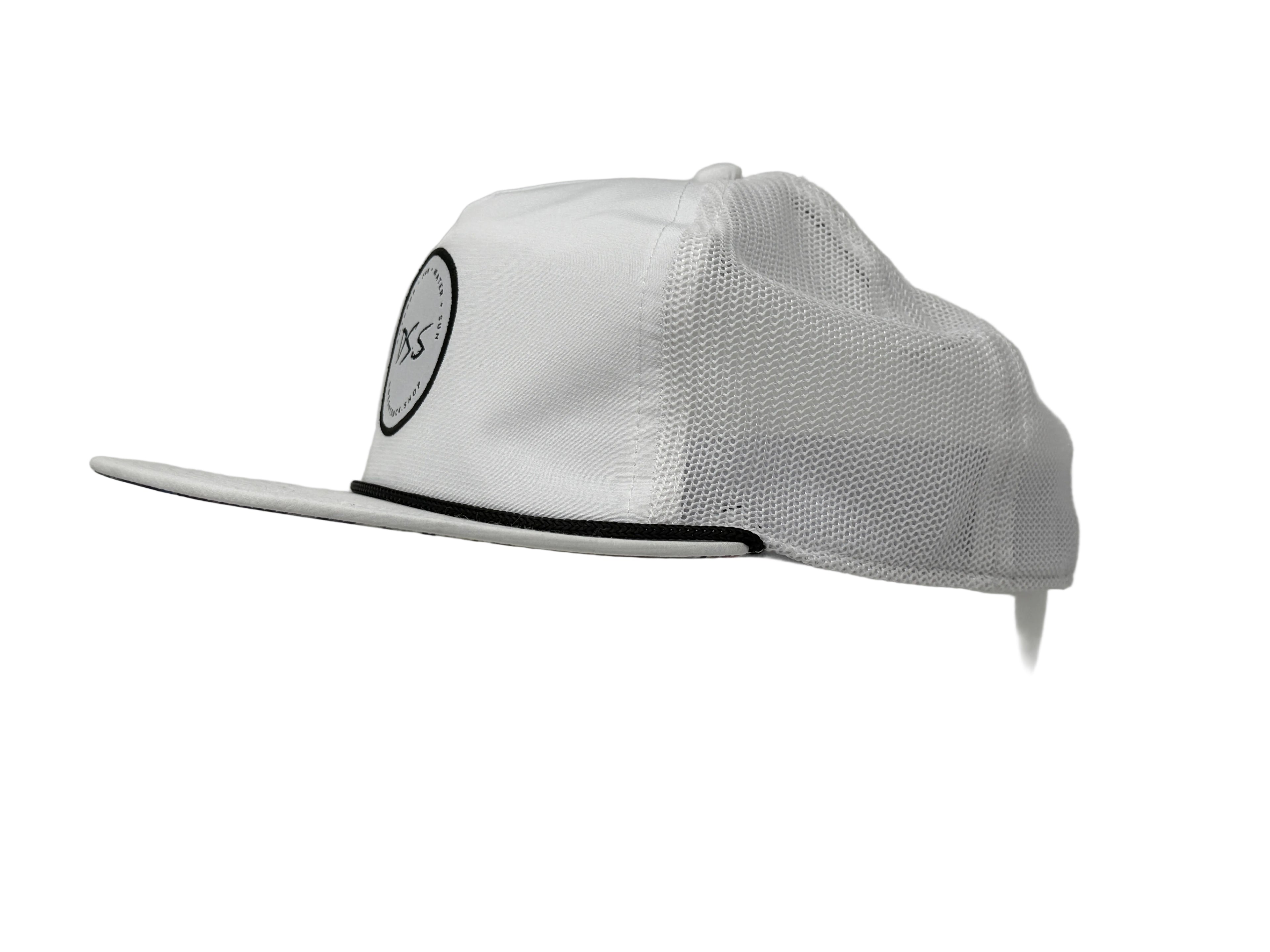 White cap with mesh back on a mannequin head against a gray background