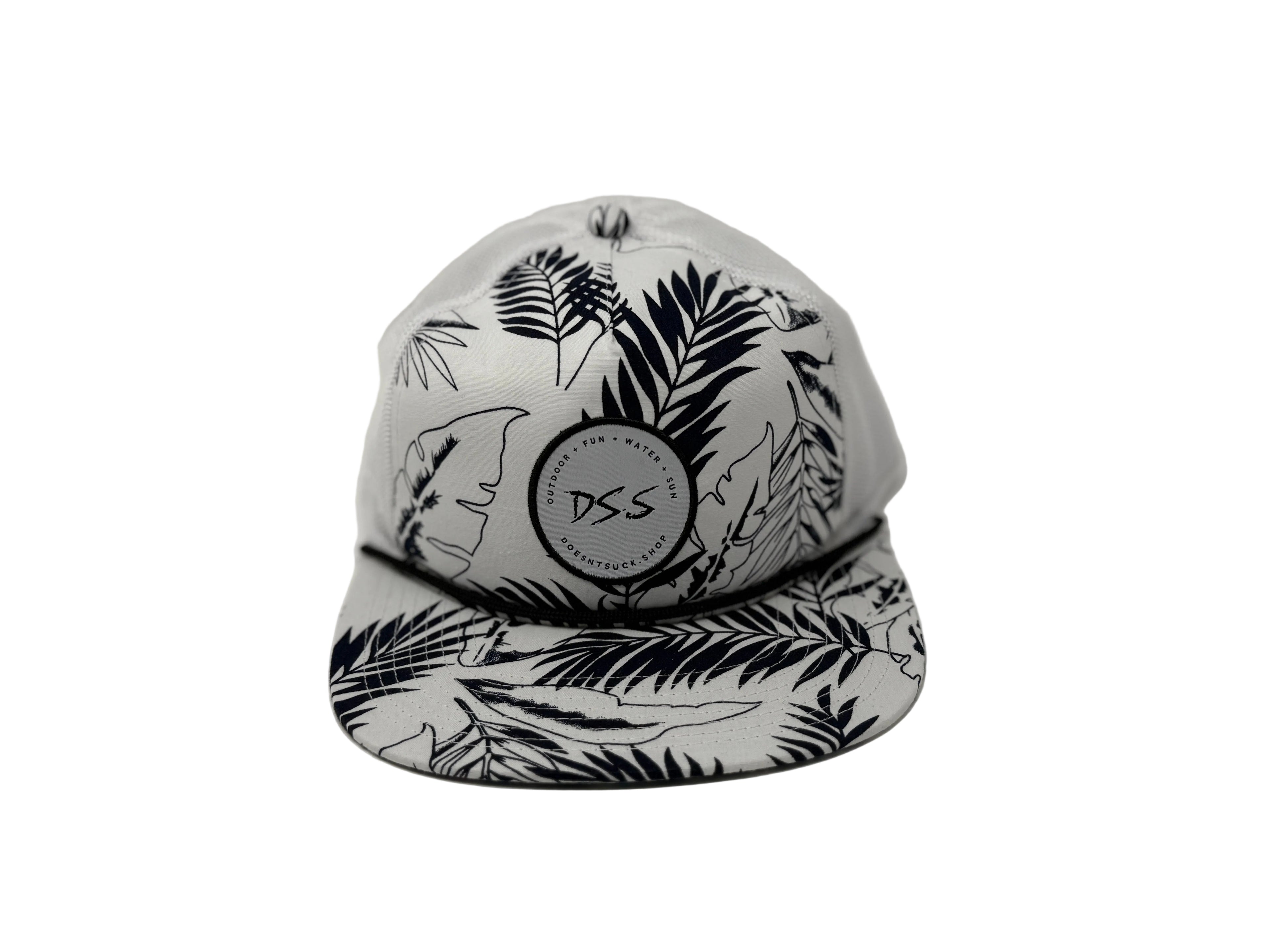 White cap with black leaf pattern and 'DSS' logo on a white background