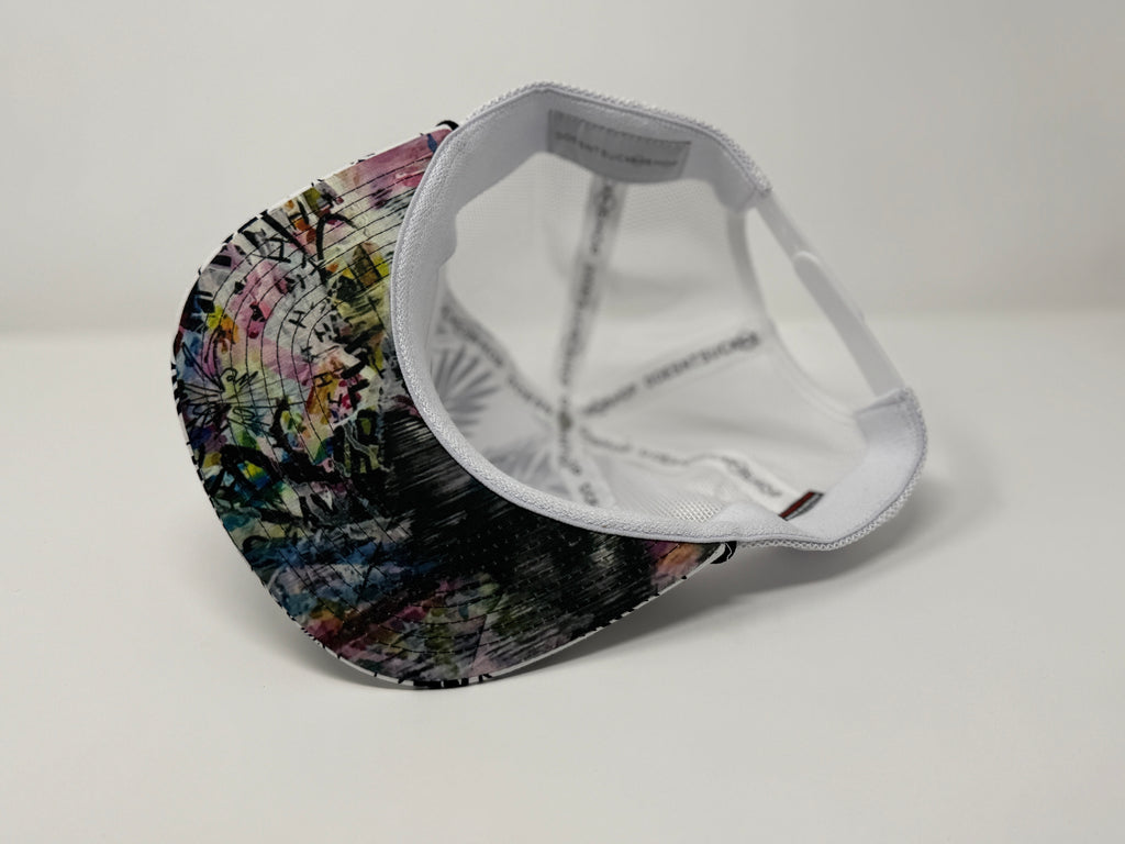 Colorful cap with a white mesh back on a light gray background