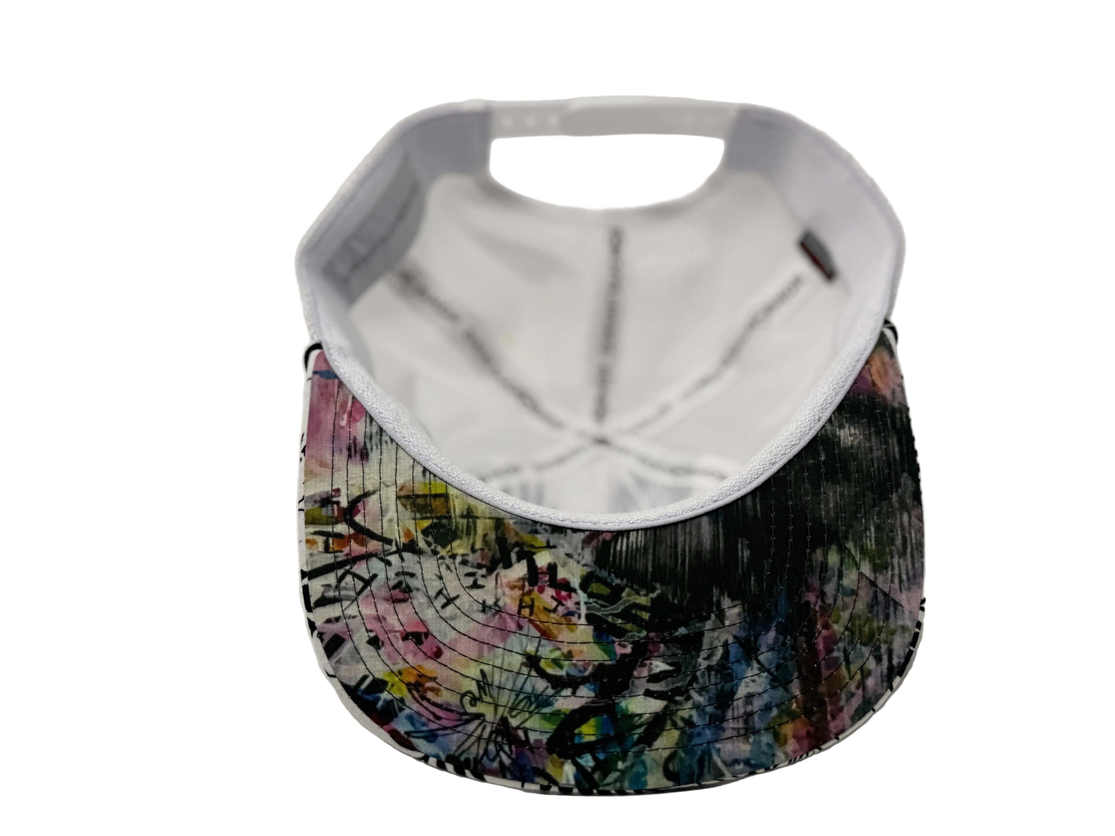 Colorful tie-dye visor cap on a white background
