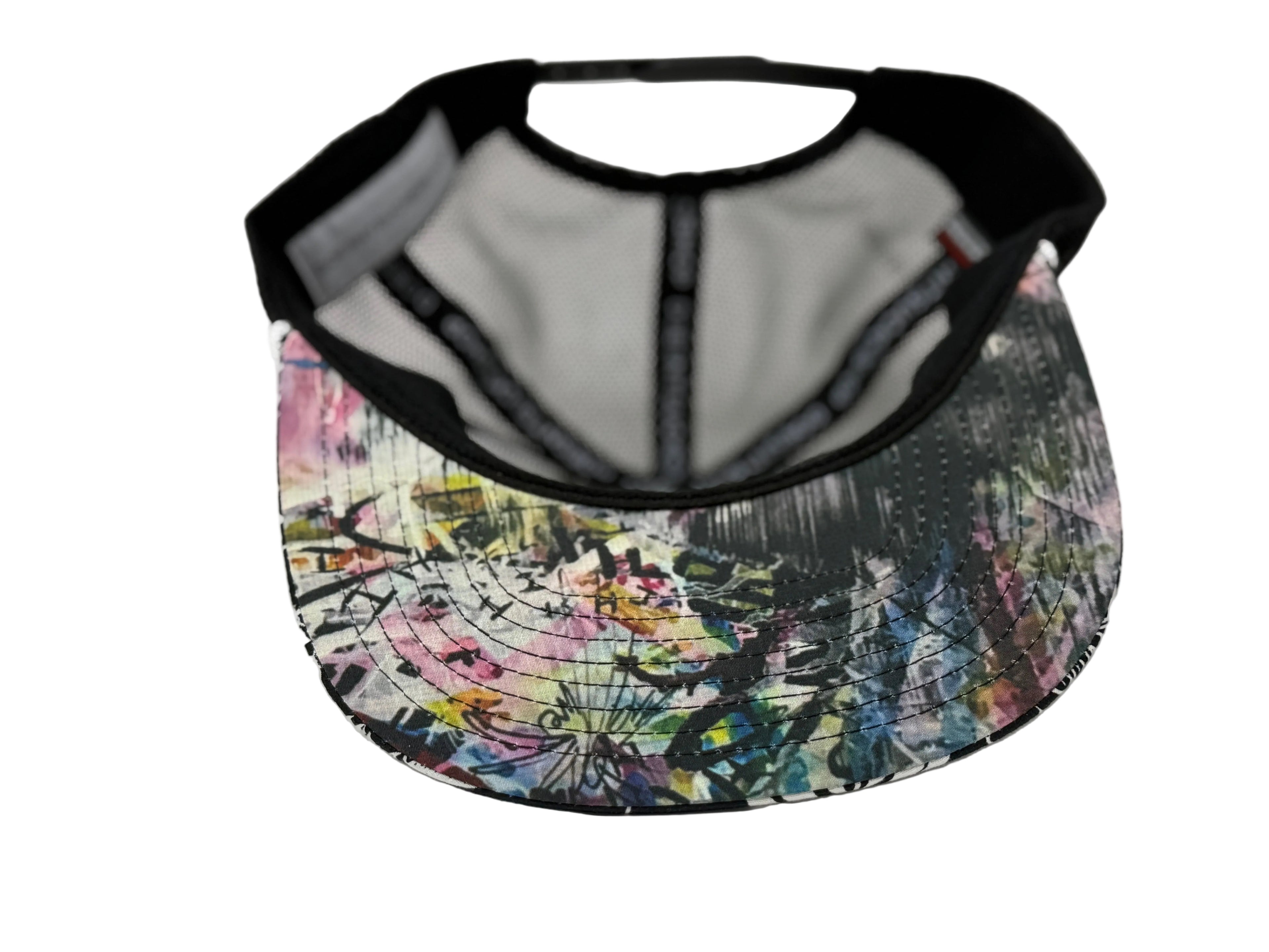 Colorful graffiti-style cap with black mesh back on a white background