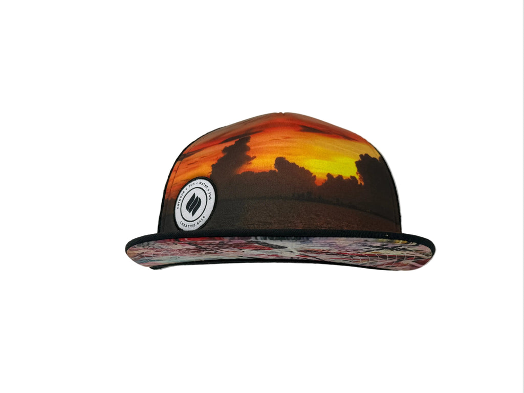 Cap with sunset design on a white background
