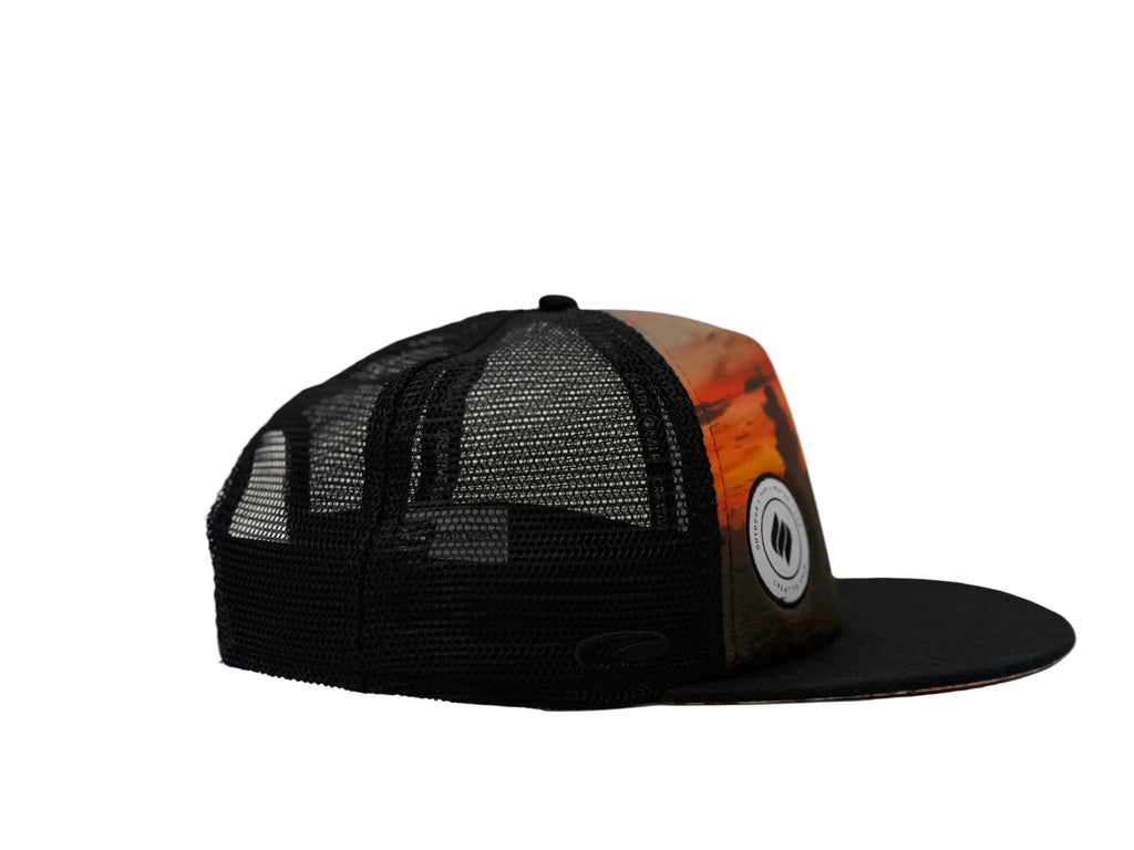 Black  trucker cap with mesh back on a white background