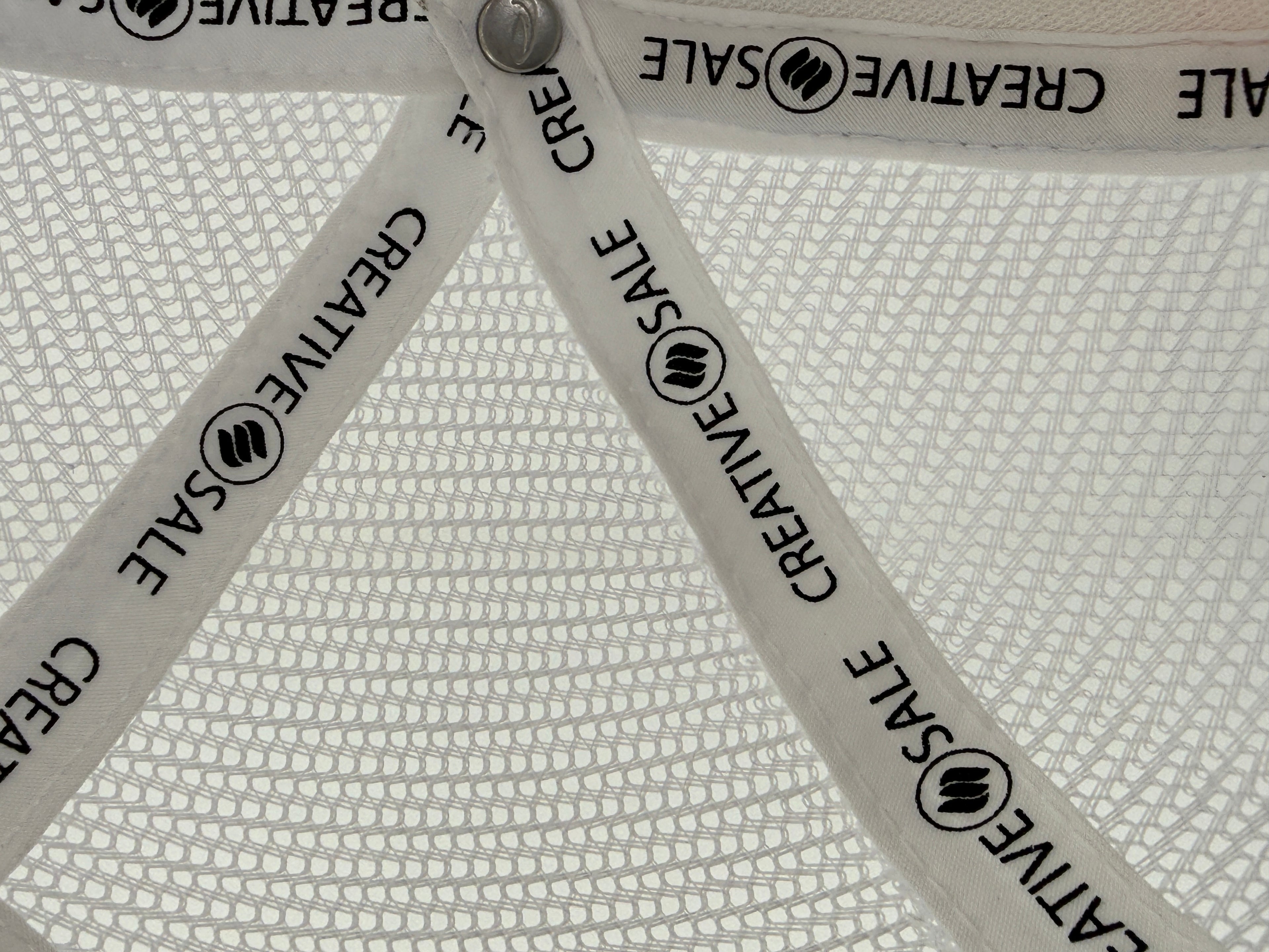 Three pairs of scissors with 'Creative Sale' branding on a textured white background