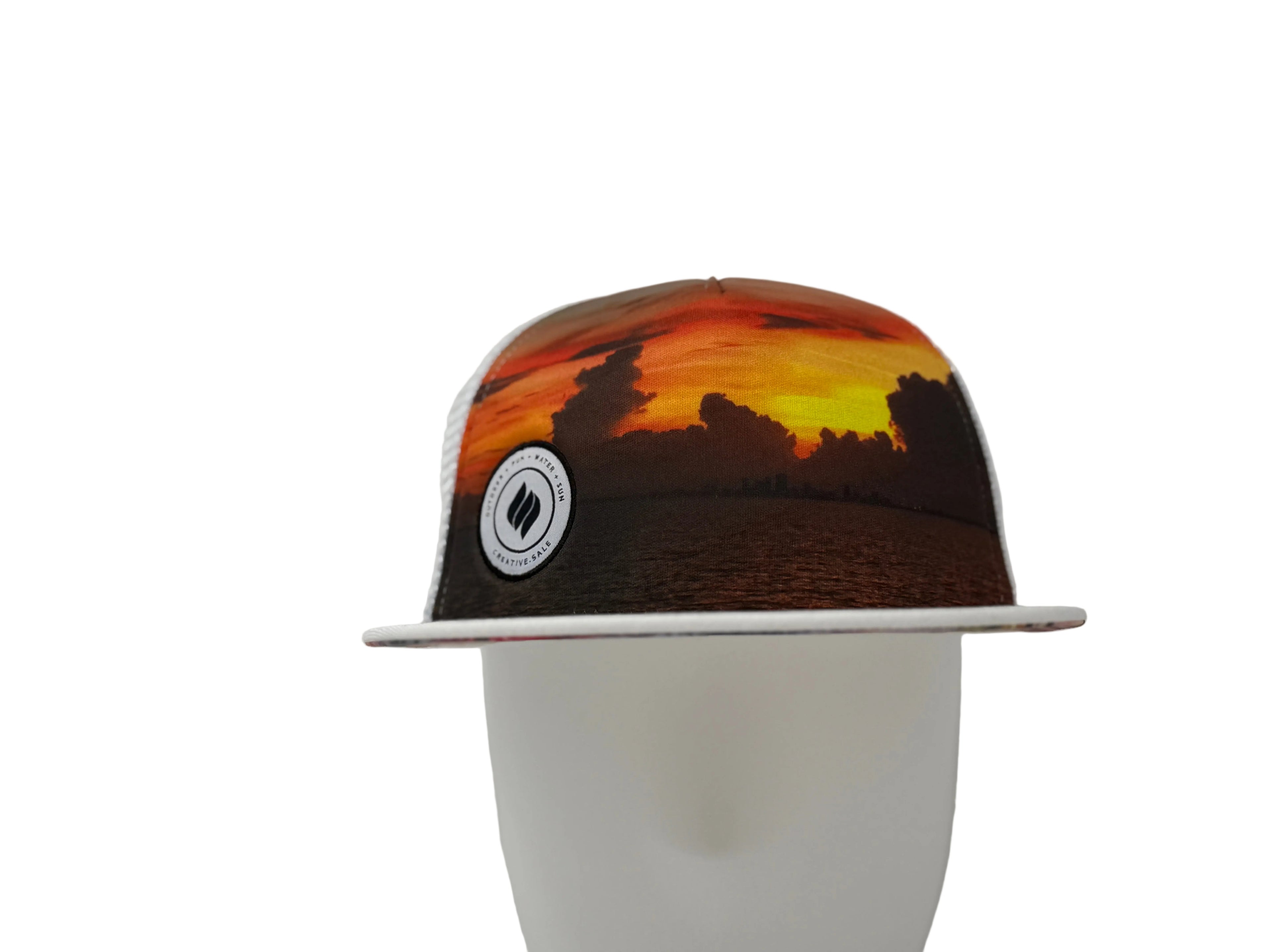 Cap with a sunset design on a white background