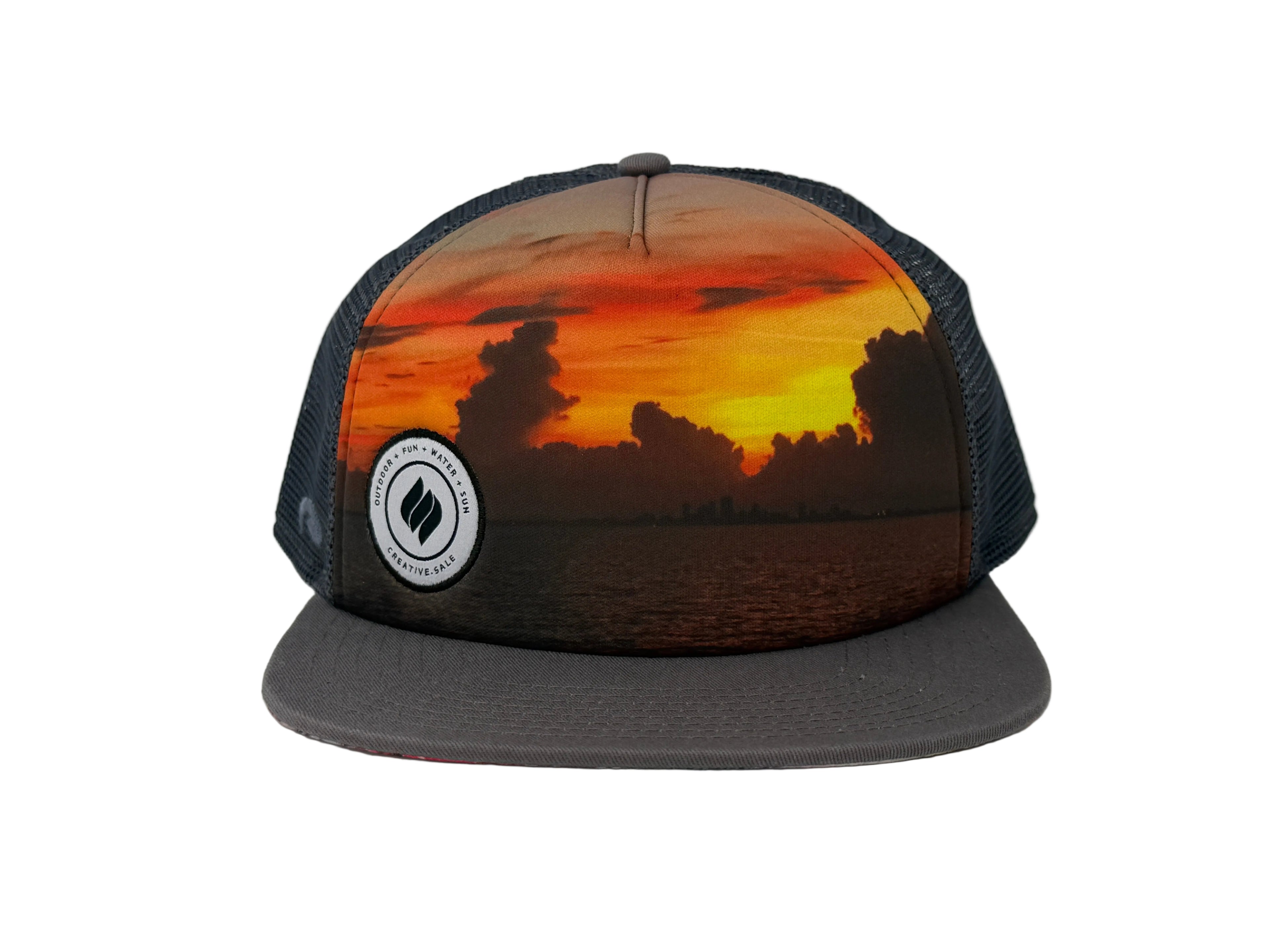 Charcoal Trucker hat with sunset design and logo on a white background