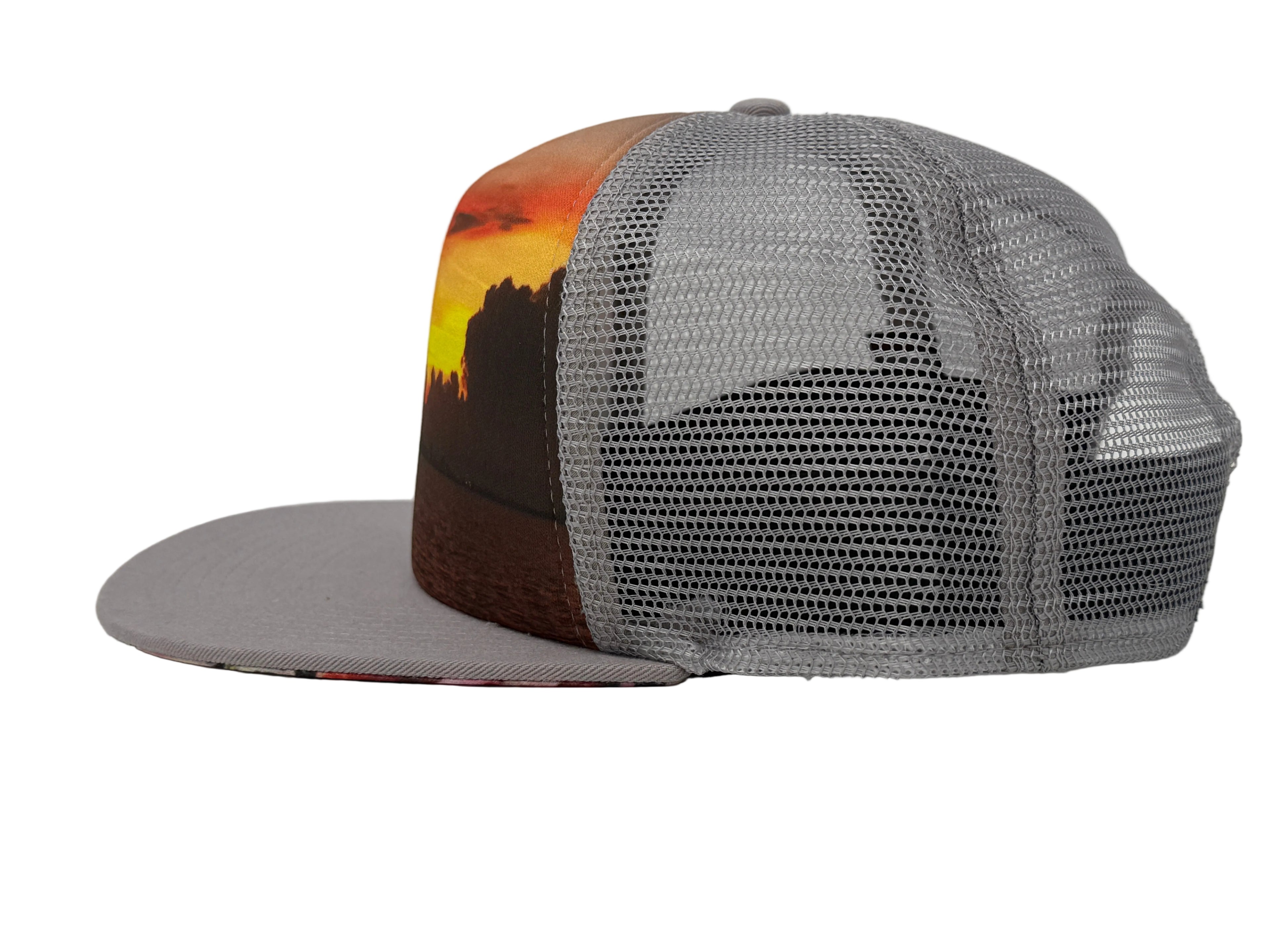 Gray mesh cap with a scenic design on a white background